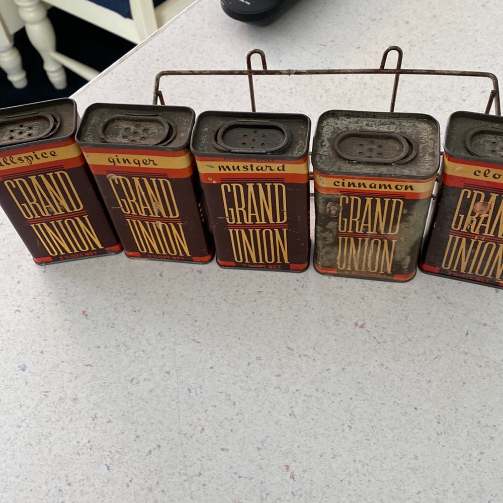Vintage Grand Union spice tins in holder